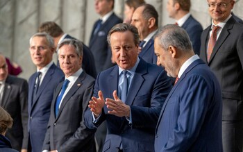 NATO Secretary General Jens Stoltenberg, and Anthony Blinken (US Secretary of State) watch David Cameron (UK Secretary of State for Foreign Affairs) and Hakan Fidan of Turkey in conversation